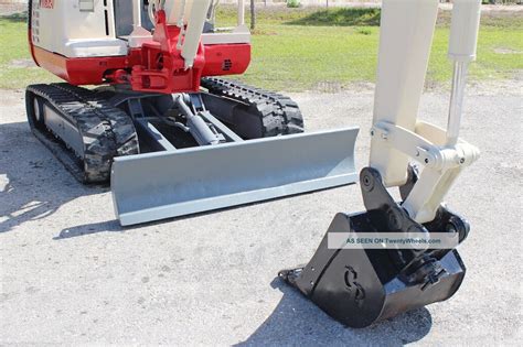 takeuchi excavator bucket|takeuchi excavator quick coupler.